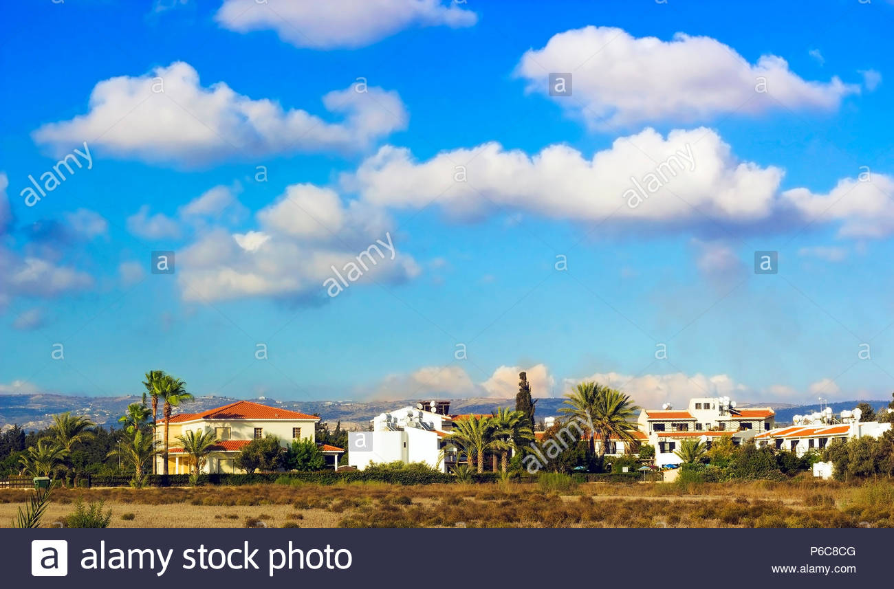 Landscape Of Town Paphos With Houses Trees And Mountains In