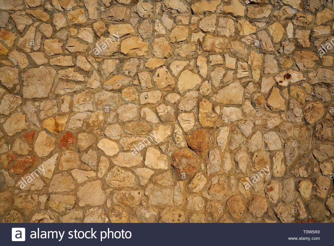 Masonry Wall Stonewall In Mediterranean Background Stock Photo