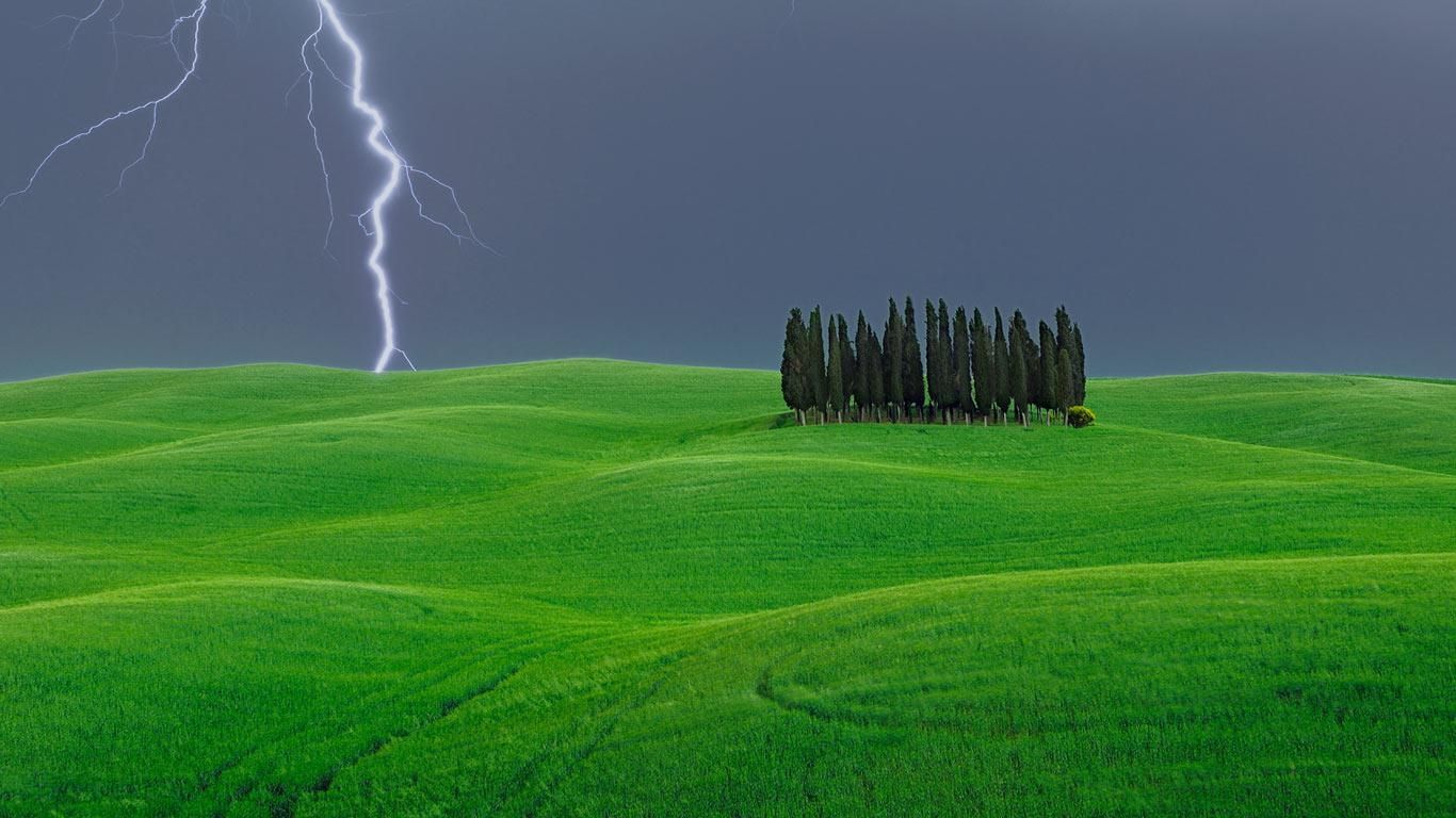 Bing Image Archive Lightning Strike Near A Grove Of Cypress Trees
