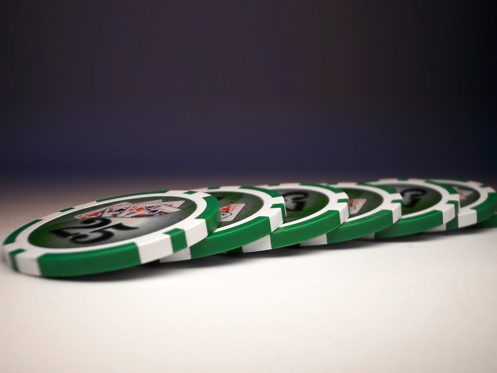 Green Poker Chips Wallpaper Stock Photos