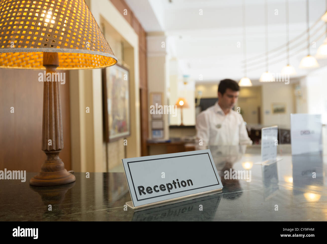 Hotel reception desk High Resolution Stock Photography and Images 1300x973