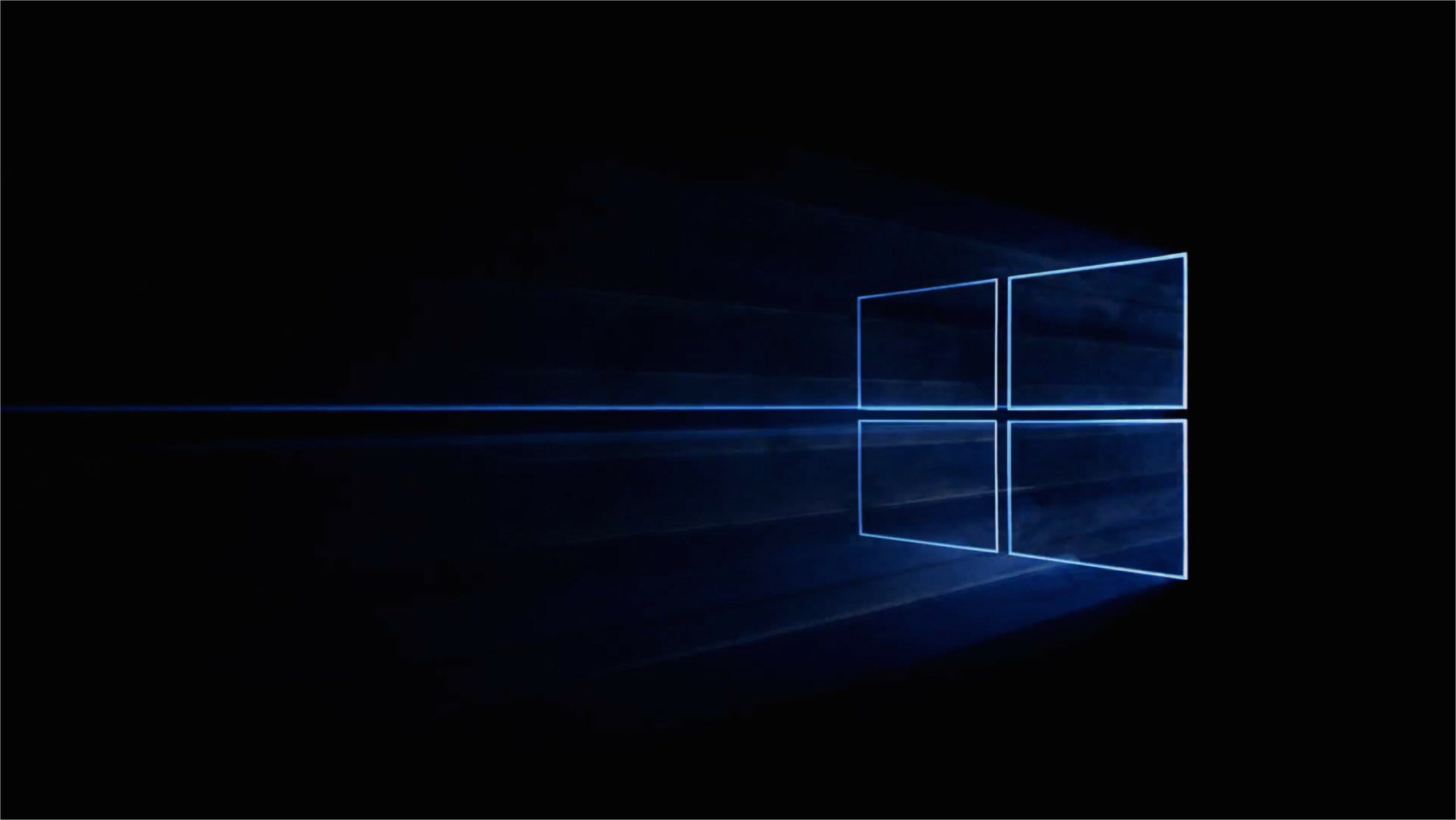 Dark Windows 10 4K Wallpaper with glowing logo