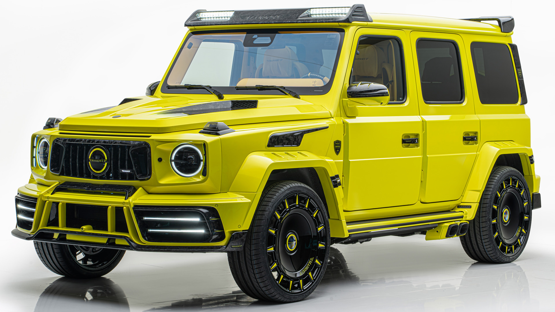 A Mansory Gronos 2024 Nosferatu, a modified Mercedes-AMG G 63, in vibrant yellow, showcasing its custom body kit, carbon fiber accents, and unique wheel design
