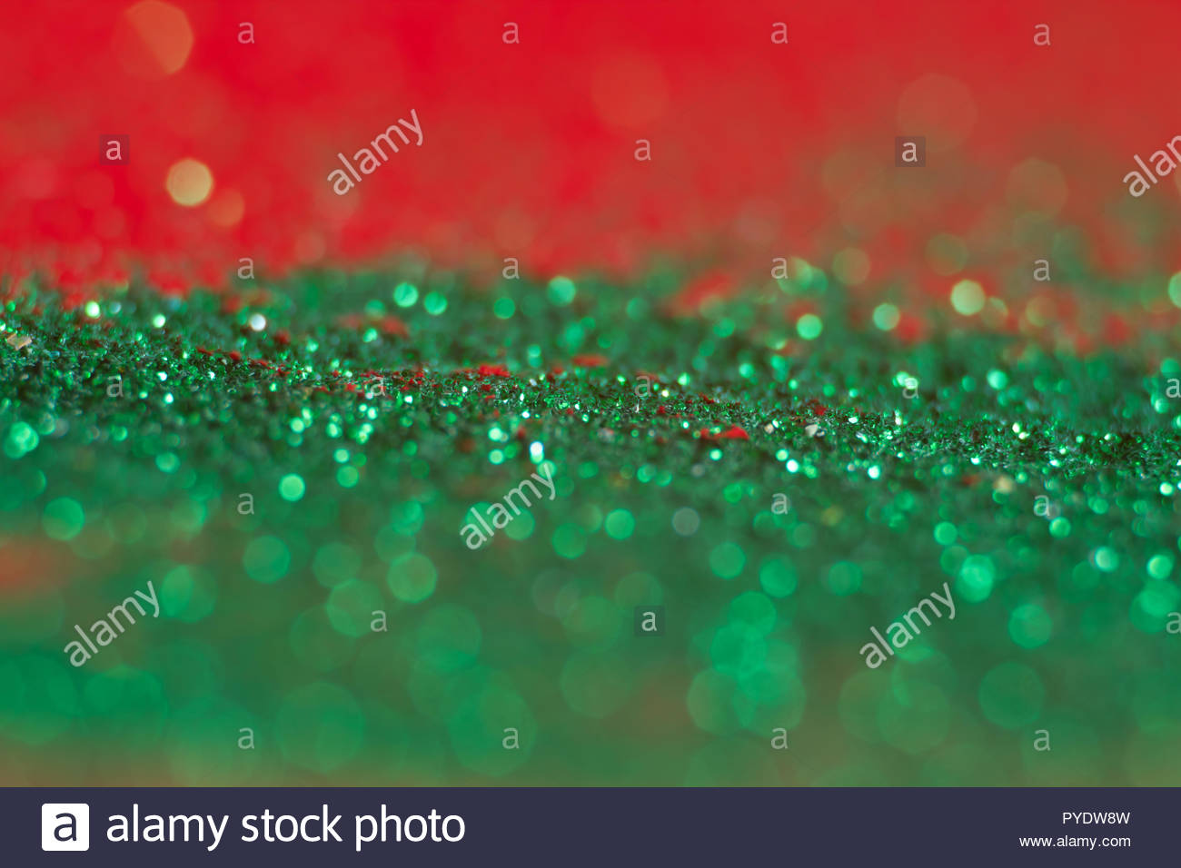 Green abstract bokeh on red background Defocused Free space for
