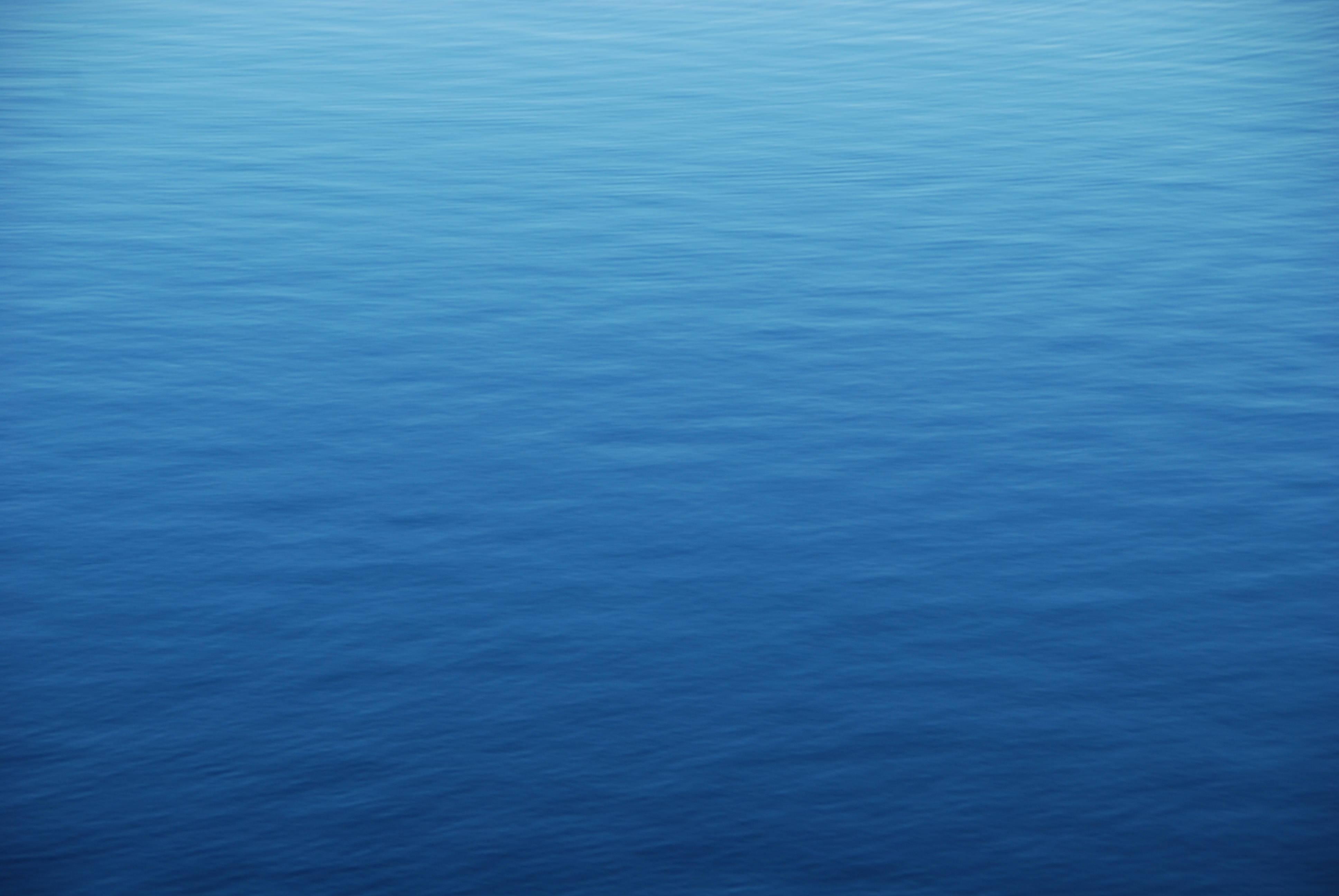 From Above Of The Calm Blue Ocean Water Wallpaper