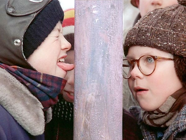  to a pole as Ralphie Peter Billingsley looks on in A Christmas Story