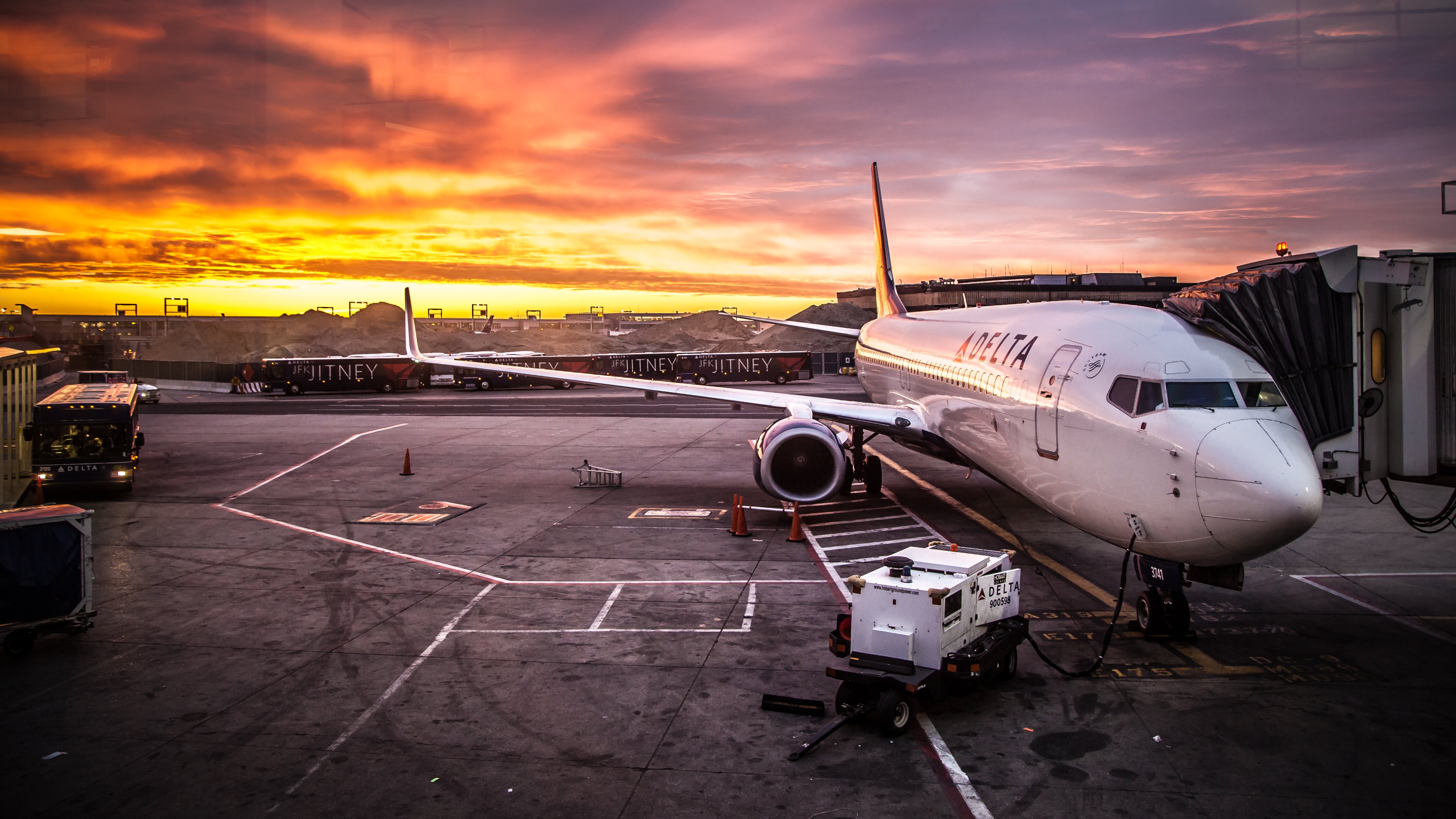 Delta Airlines Boeing 737 at Sunset on Airport Tarmac
