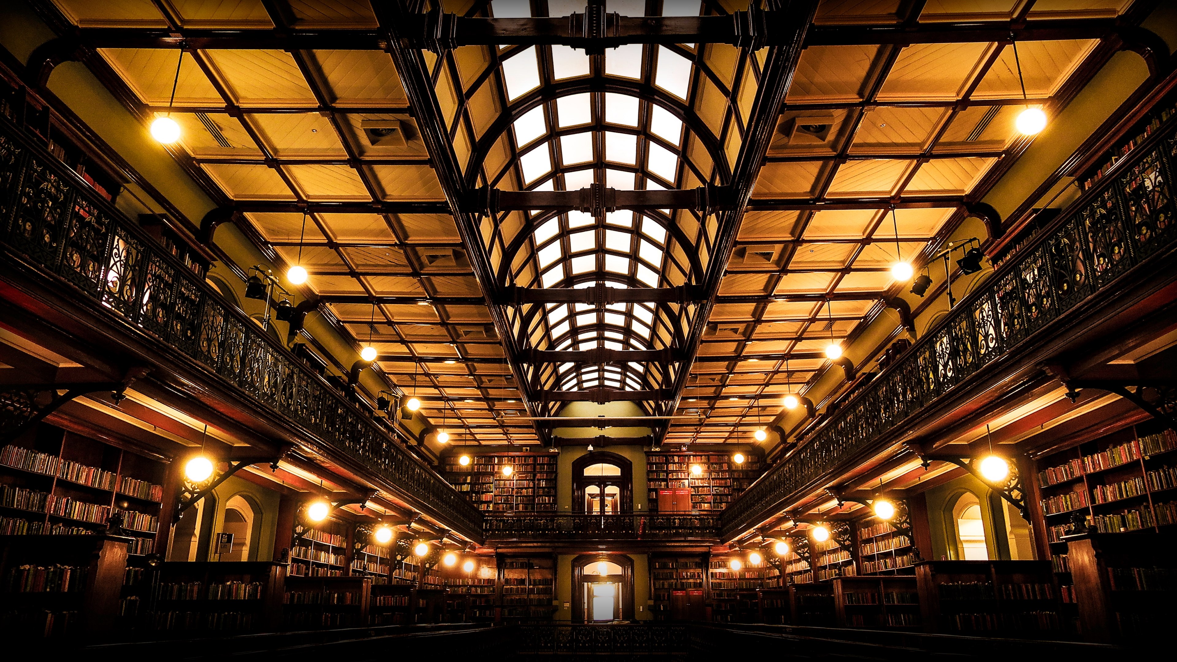 The Interior Of A Vast Library Impressive Collection 4k HD Wallpaper