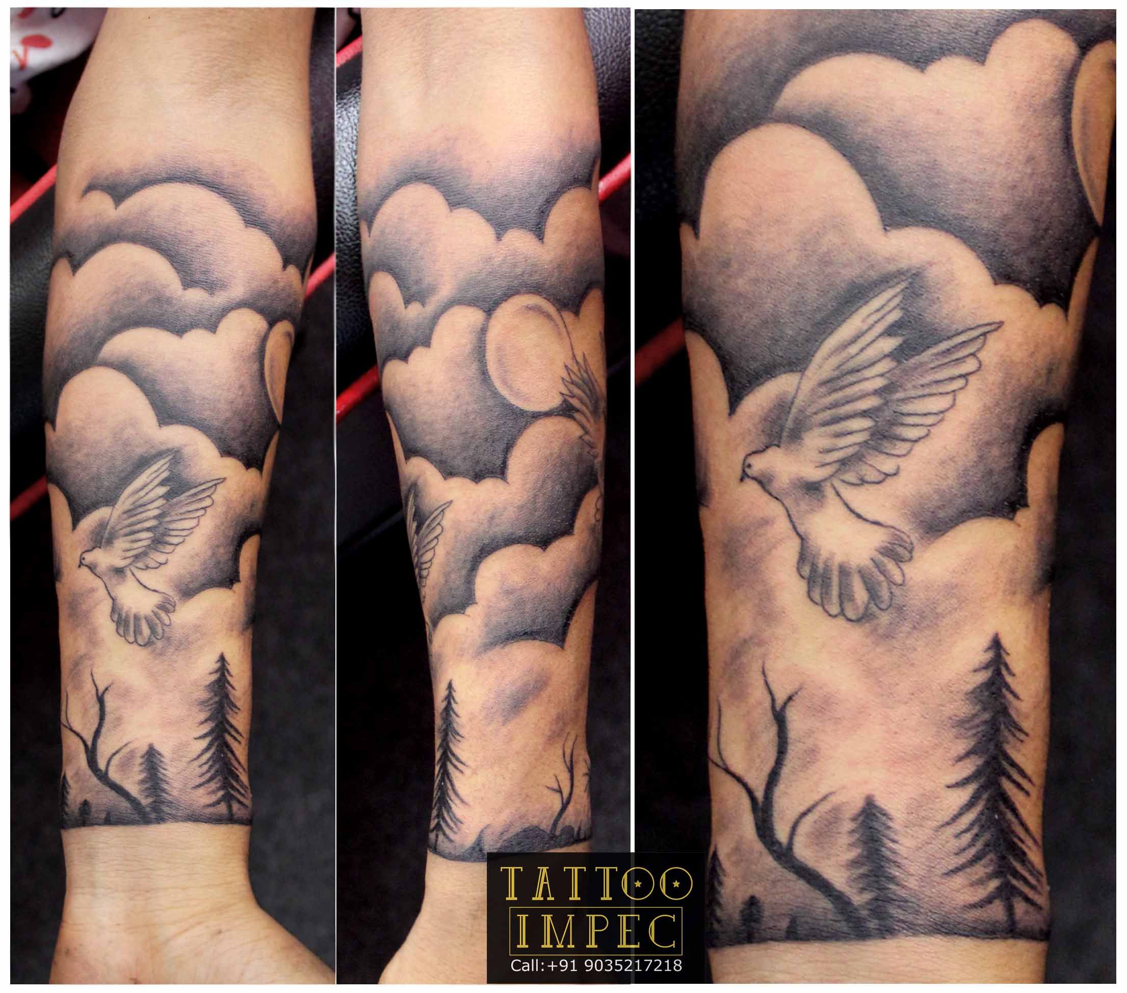 Black and Grey Dove and Clouds Forearm Tattoo