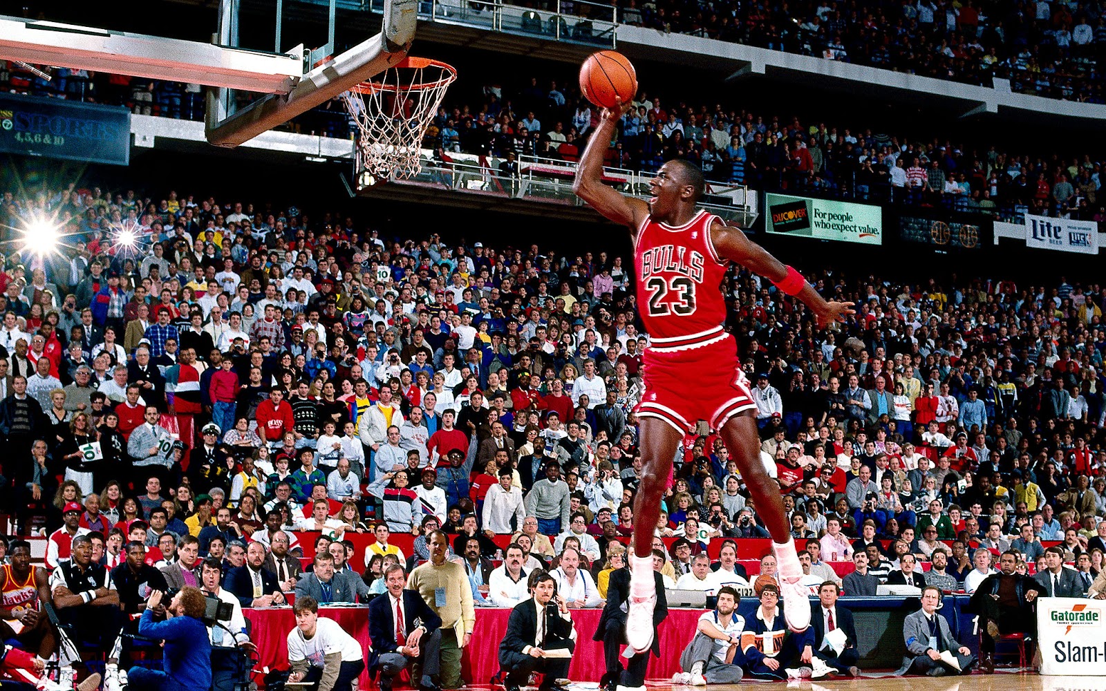 50 year old Michael Jordan dunks at his basketball camp while wearing