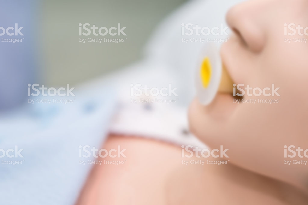 Blurry Background Of Dummy Patient On Oropharyngeal Airway To Open