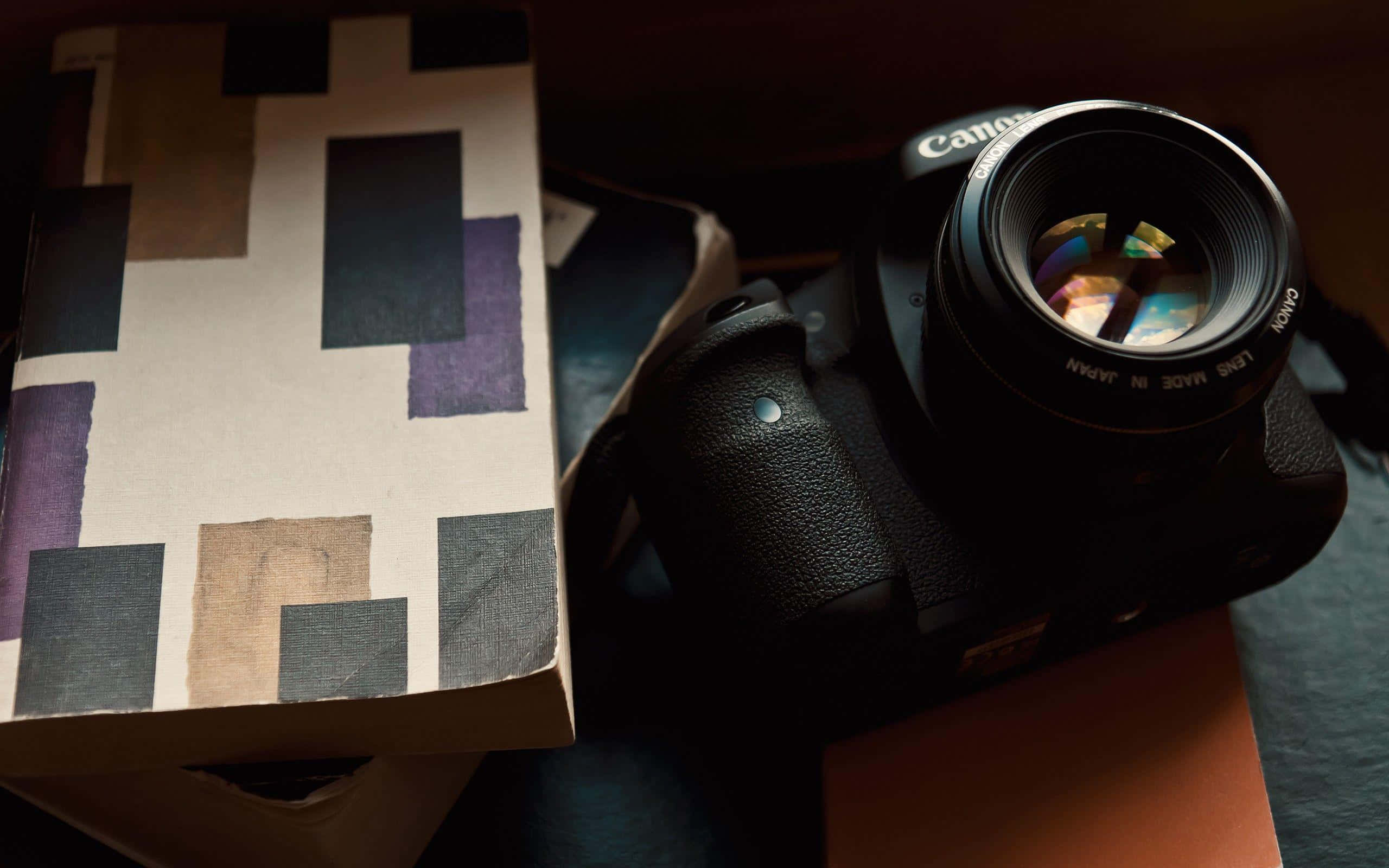 Capture Every Moment With A Dslr Camera Wallpaper