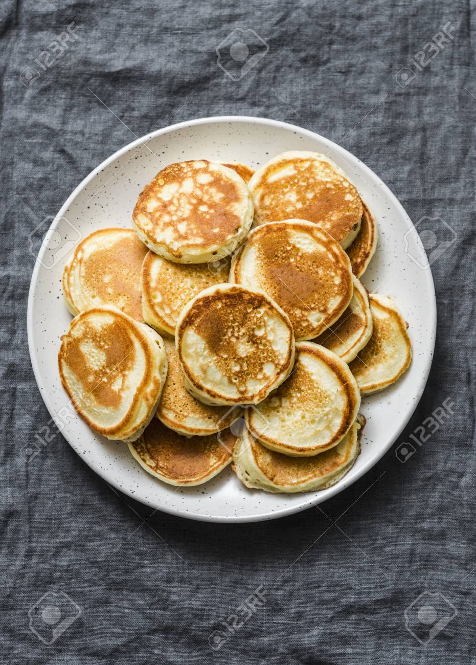 Heap Of Mini Pancakes On A Gray Background Top Delicious