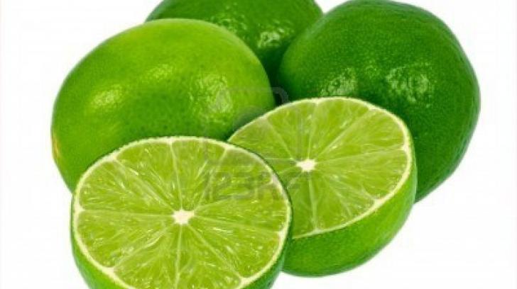 Stock Photo Green Limes Isolated On A White Background One Lime Is