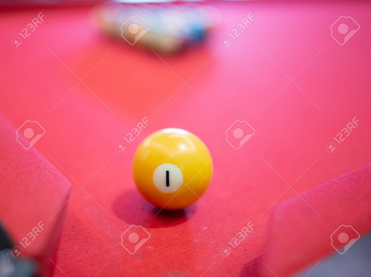 Billiard Ball On Red Table Background In Pub Bar Room Concept