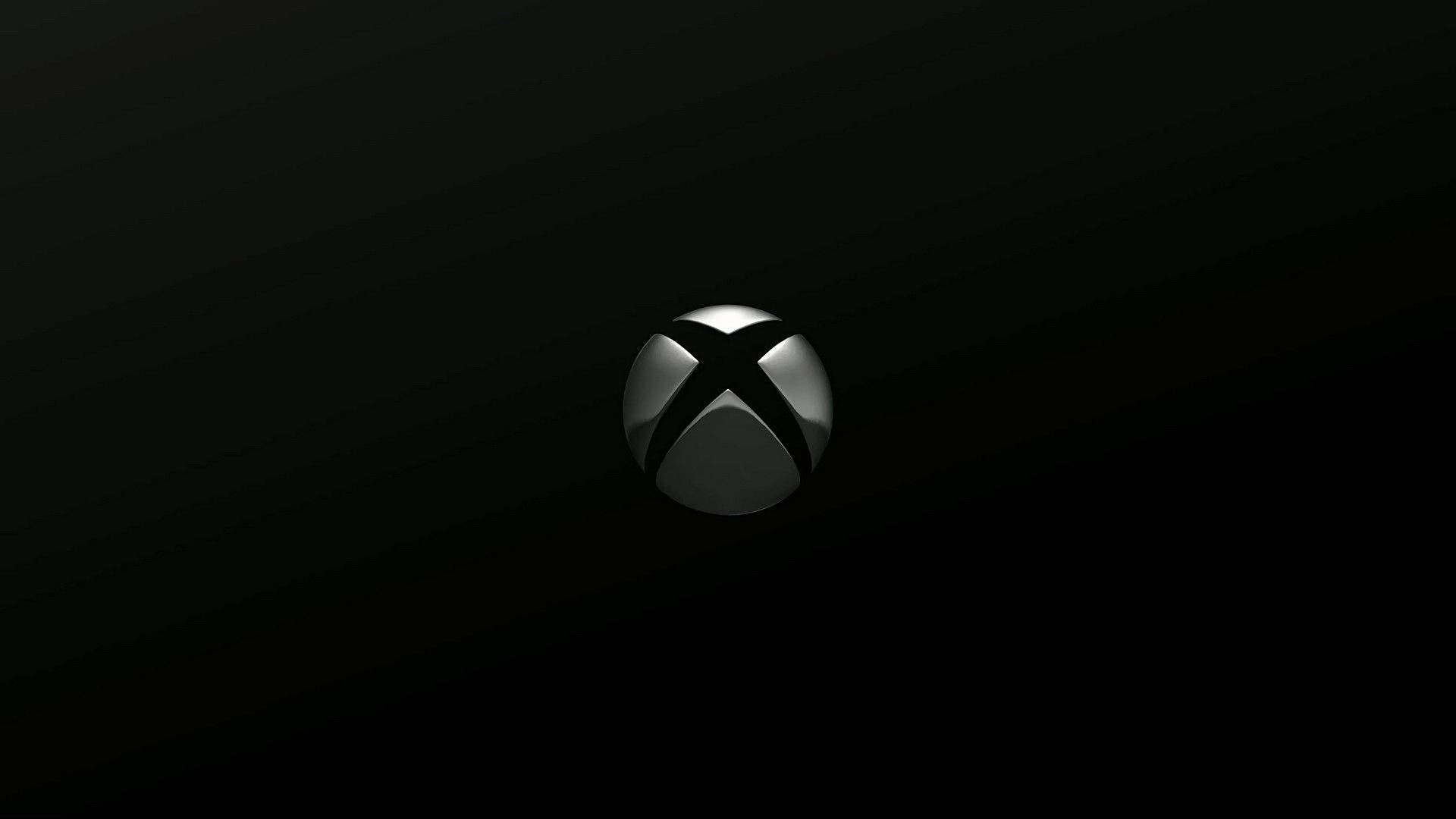 Sleek, metallic Xbox logo on a dark background