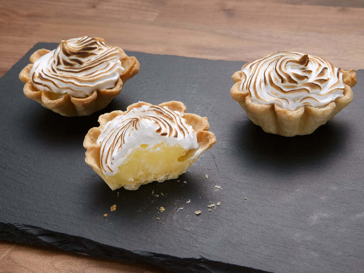 Glistening Peaks On Top Of A Meringue Wallpaper