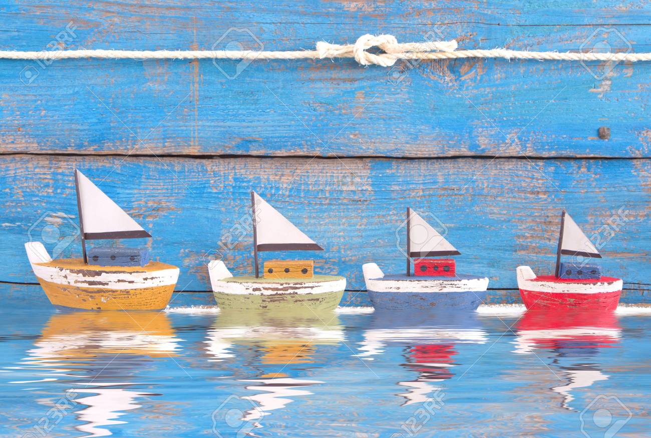 Free download Shabby Toy Boats In A Row On A Wooden Blue Background