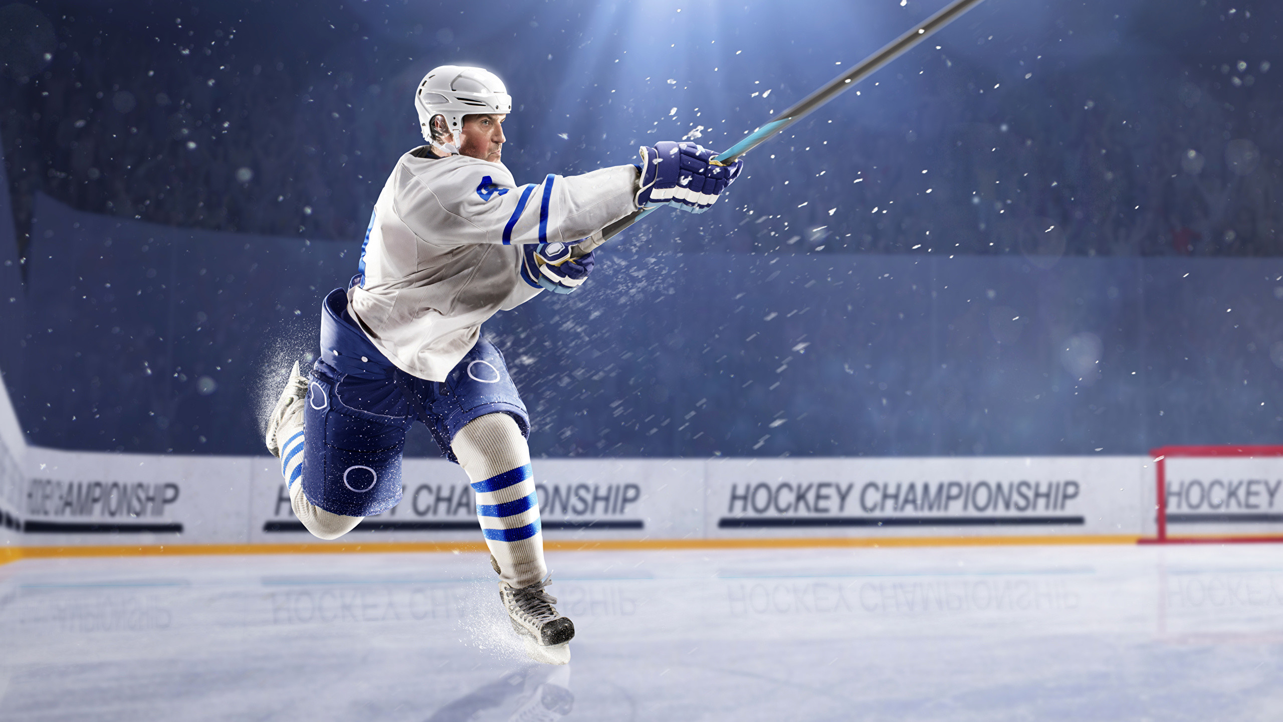 A hockey player in mid-stride, about to take a shot during a fast-paced hockey game