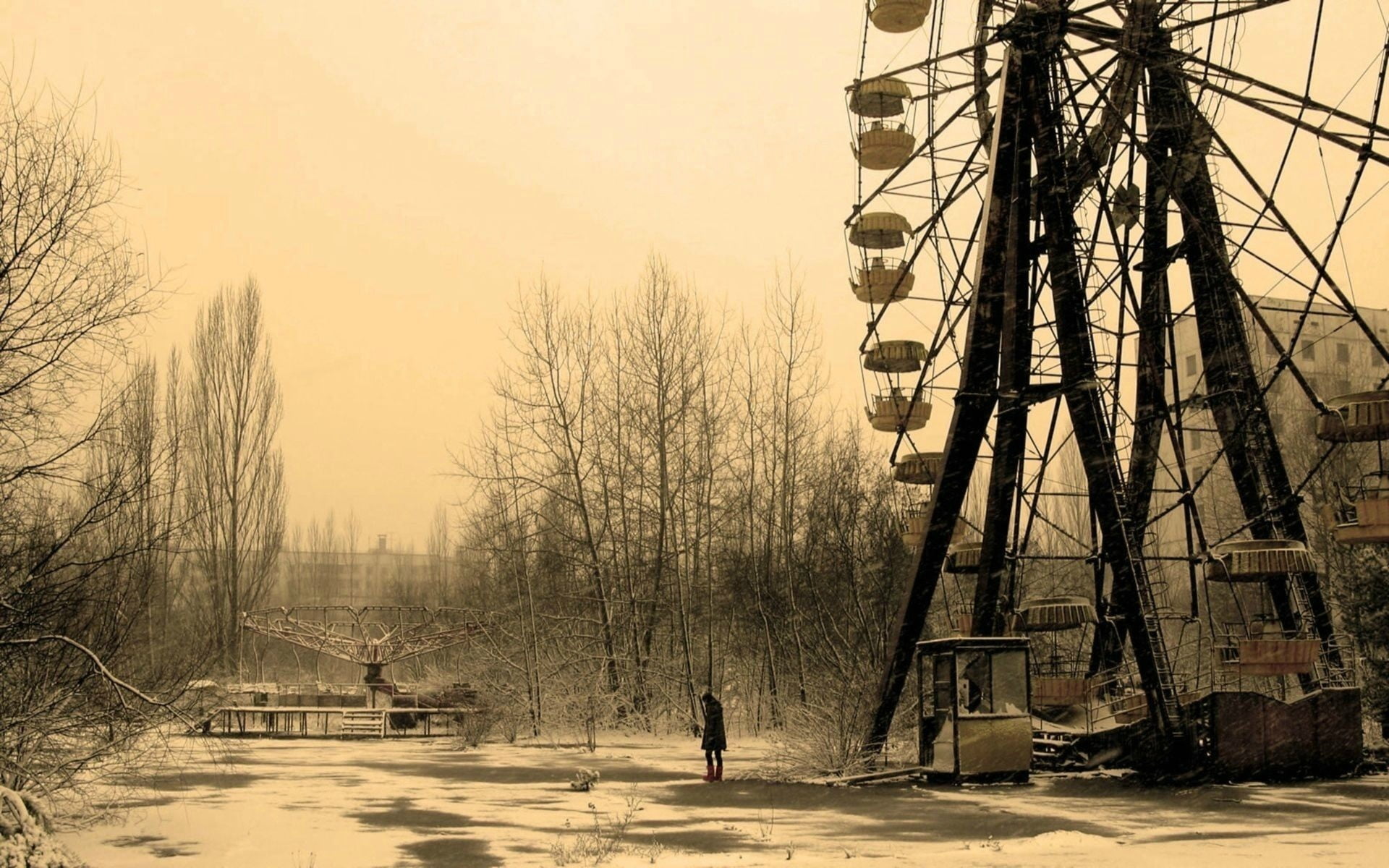 Sepia Photography Of Person Standing Near Ferris Wheel Chernobyl