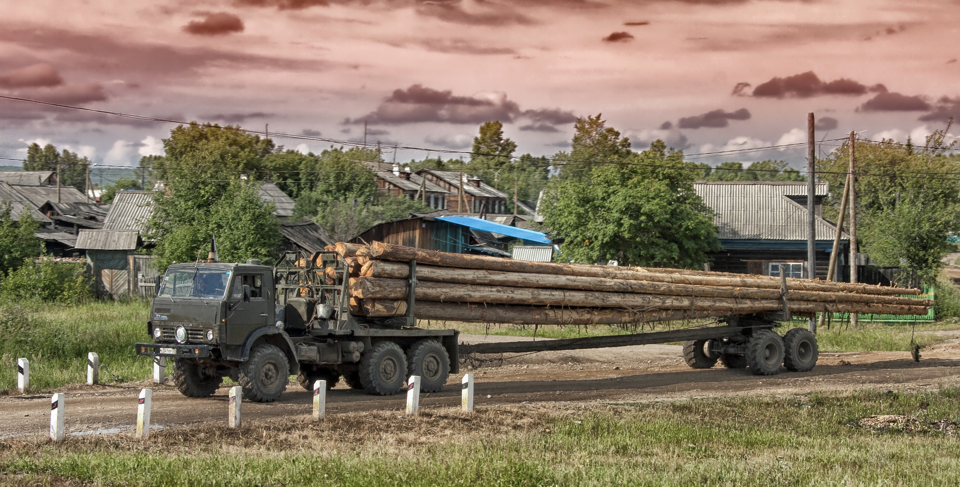 Green Logging Truck Image