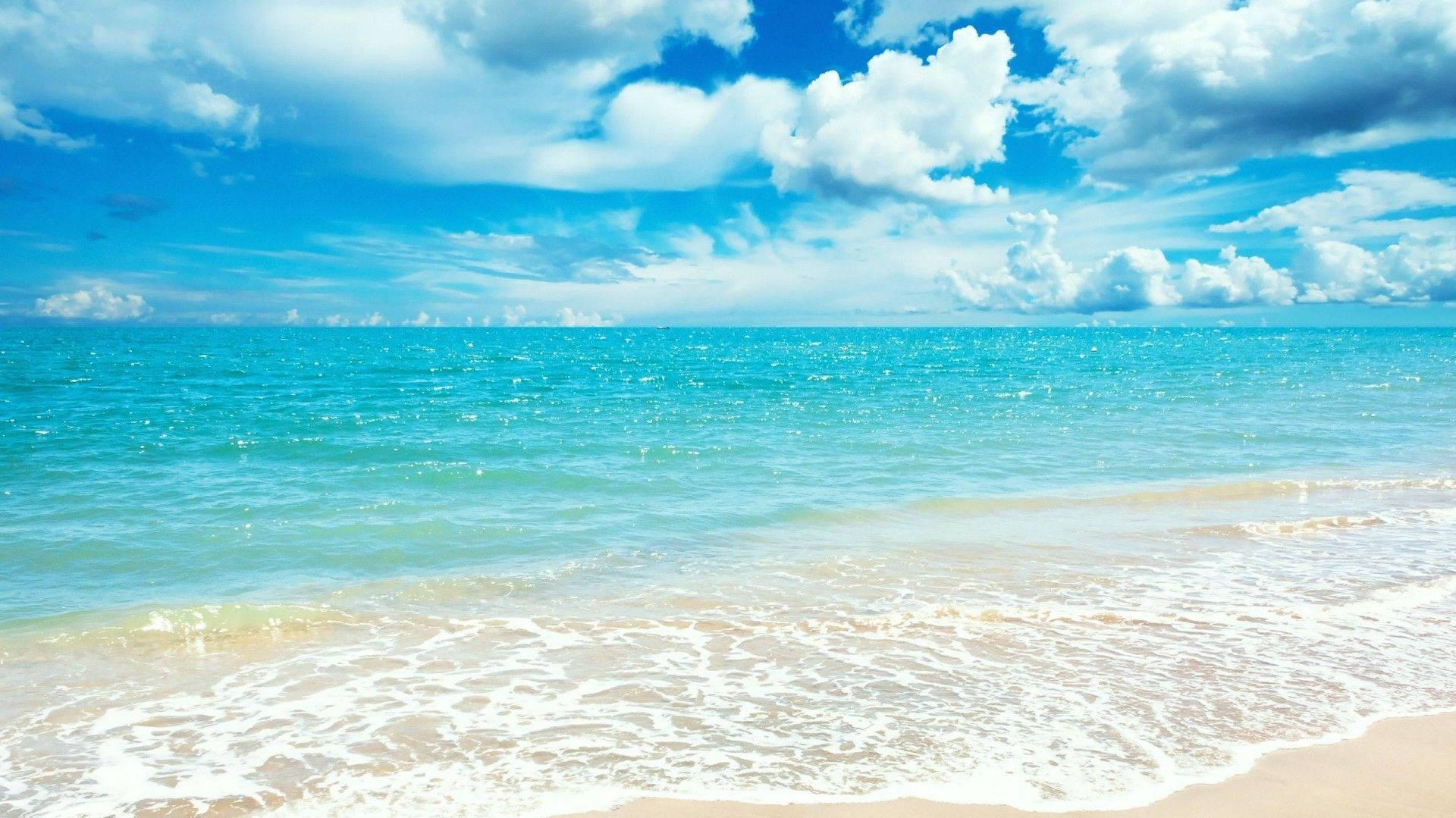 Relaxing At The Beach Enjoying Summer Sun Wallpaper