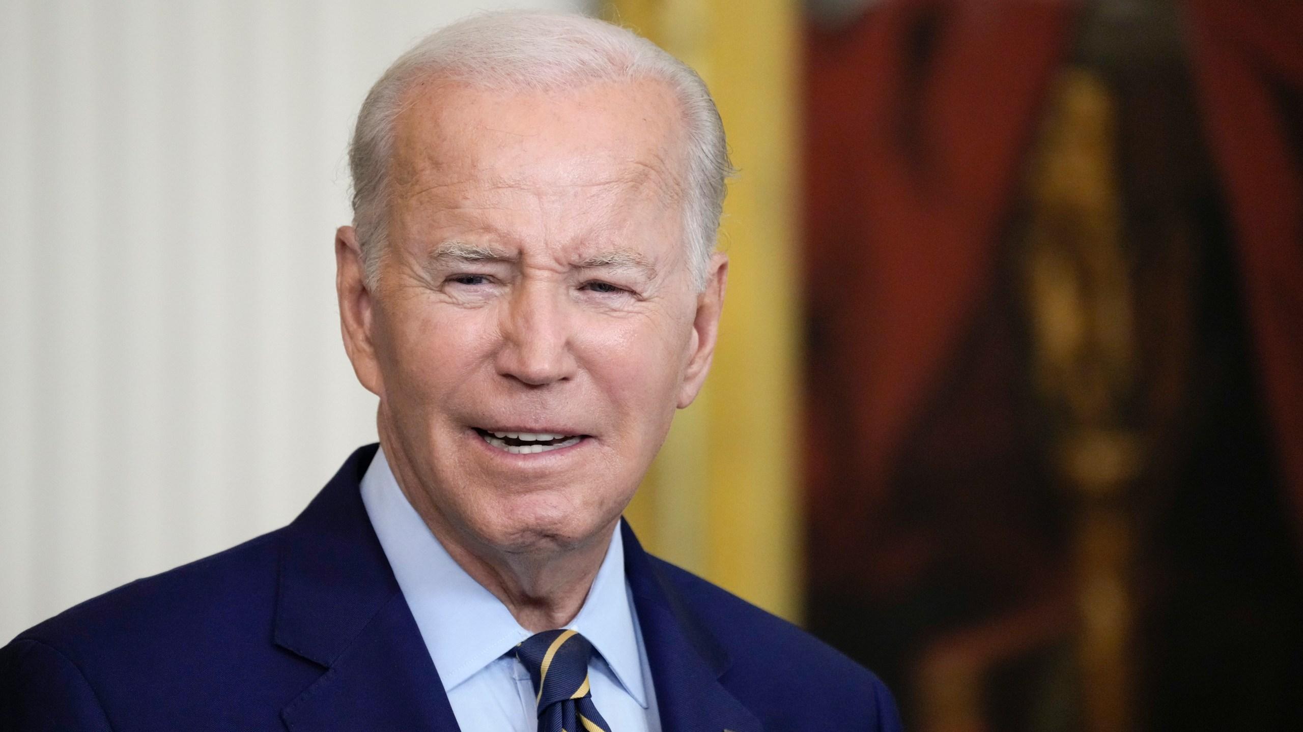 Biden heads west for a policy victory lap drawing an implicit