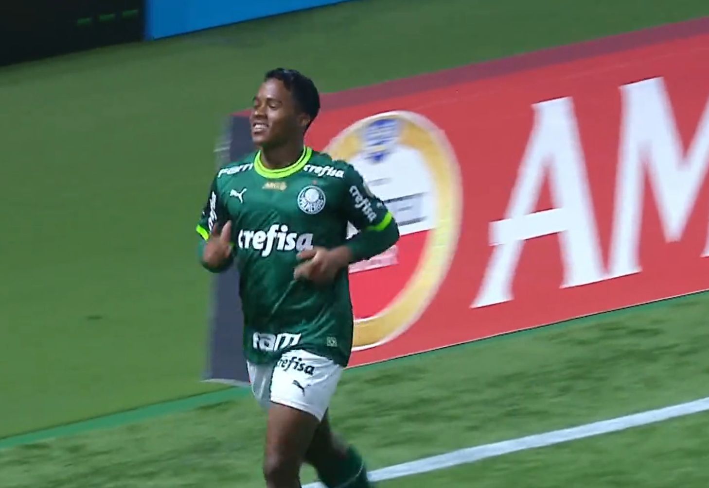 Endrick Felipe celebrating a goal or victory on the soccer field