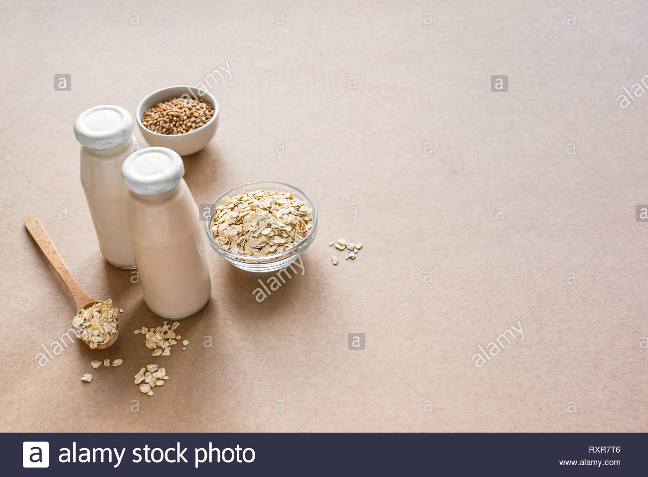 Free download Oat Milk alternative on beige background copy space