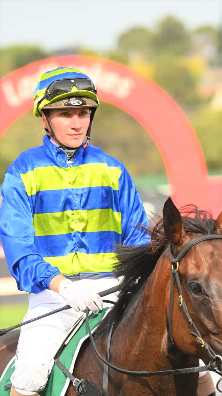Jamie Kah Smiling After A Successful Race Wallpaper