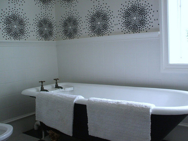 Top Half Wallpapered With Sci Fi Designs Is Very Modern Bathroom Decor