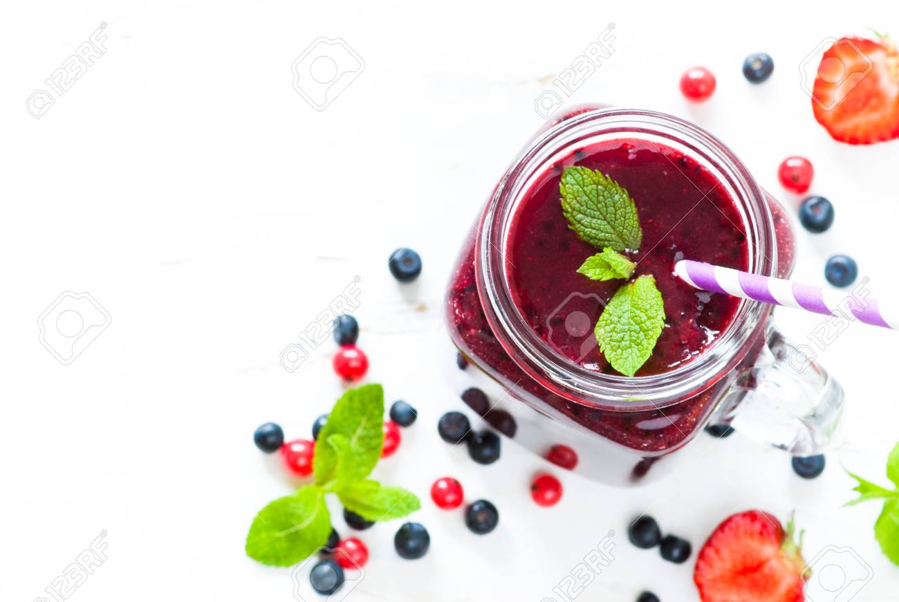 Smoothie Berry Mix In A Mason Jar On White Background