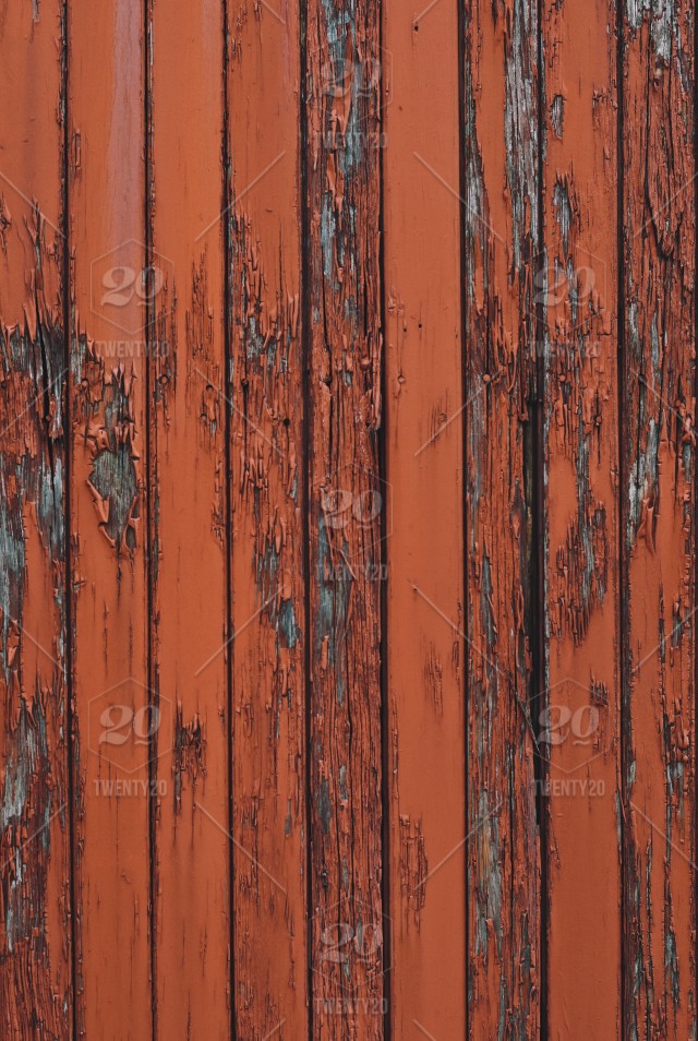Old Wooden Surface With Orange Colored Peeling Paint Stock Photo