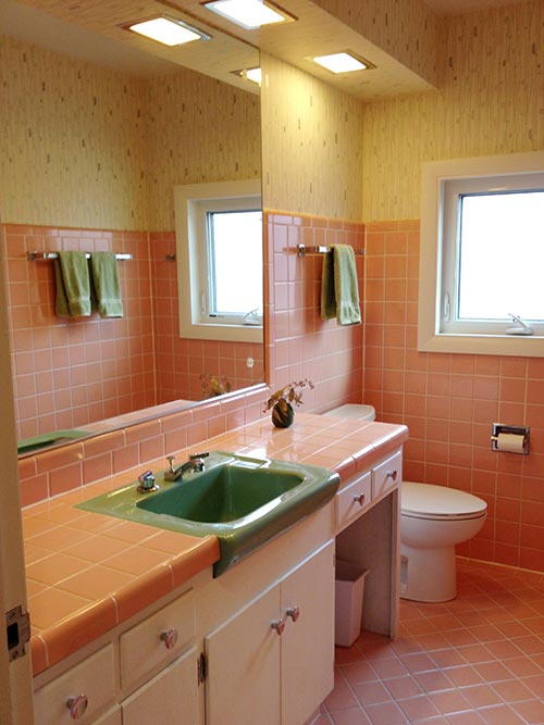 Bradbury Atomic Age Wallpaper Makes These Two 1950s Pink Bathrooms
