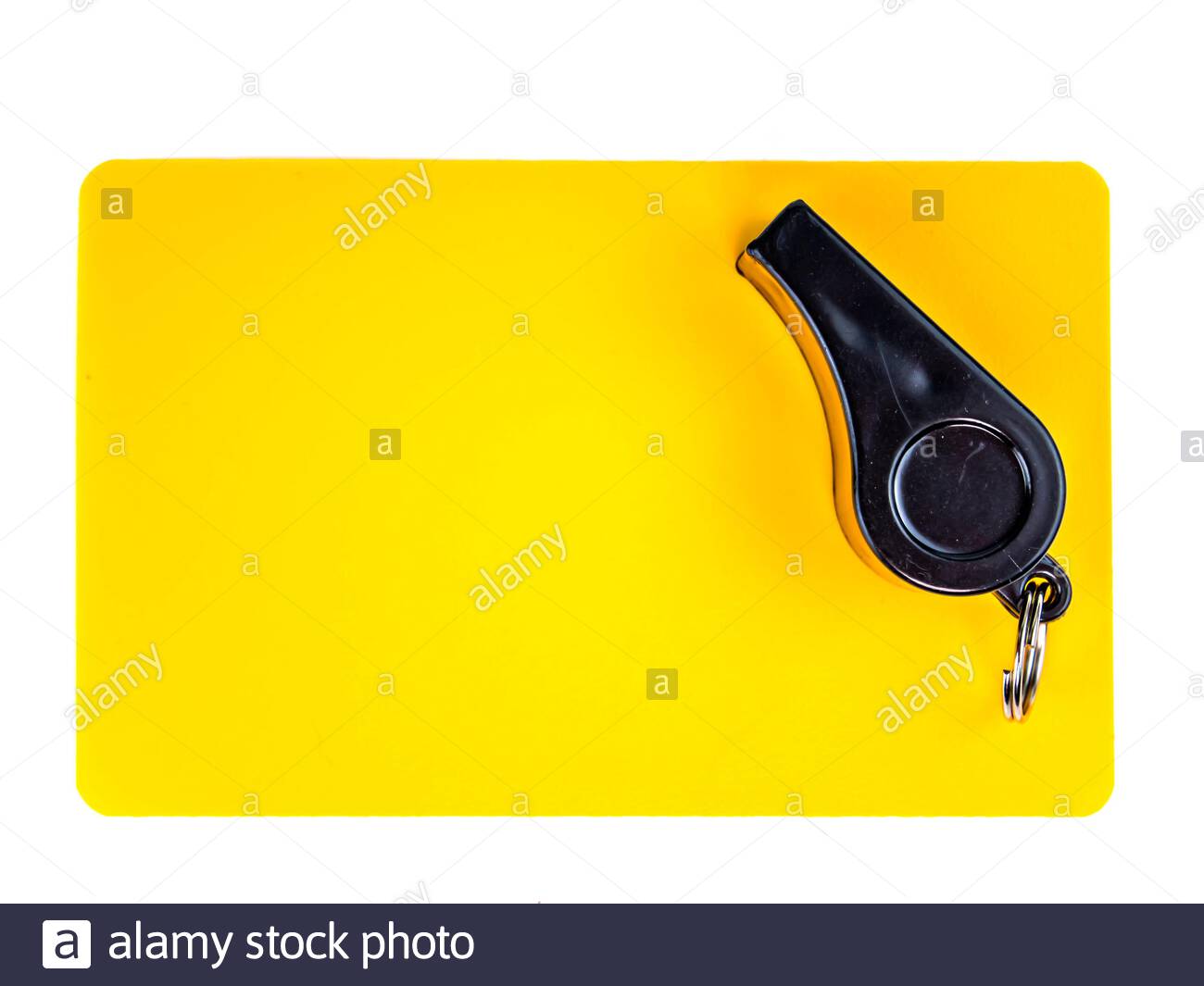 Yellow Card And Whistle Of A Football Referee On White