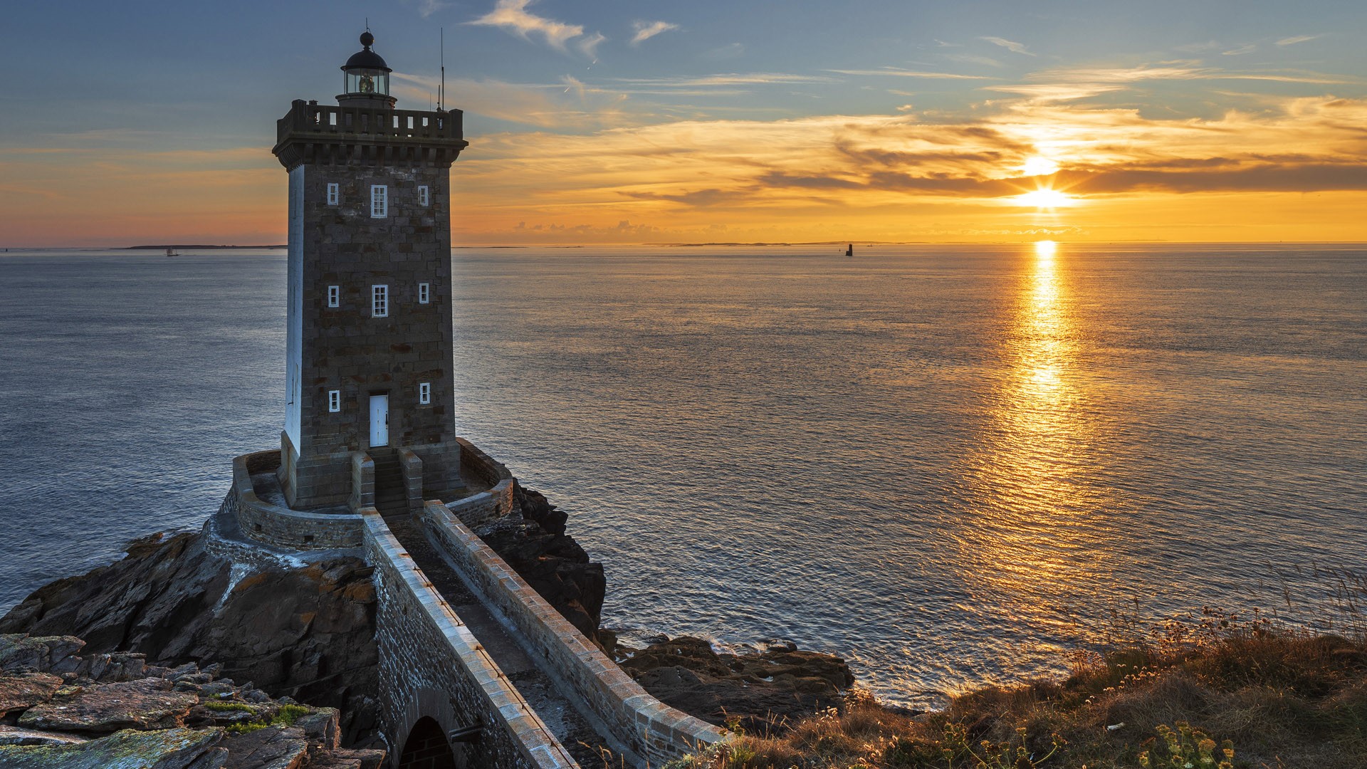 Kermorvan lighthouse at sunset Le Conquet Finistre Brittany