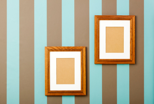 Striped Wallpaper With Empty Wood Frames On Walls Stock Photo Getty