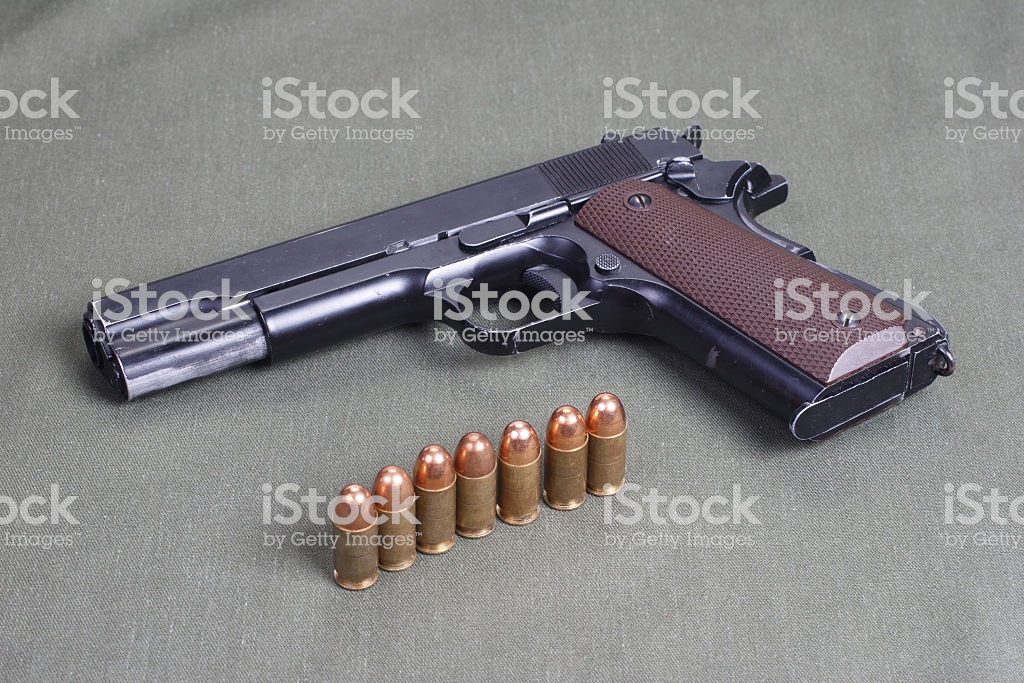 Background With Colt Government M1911 Stock Photo More Pictures