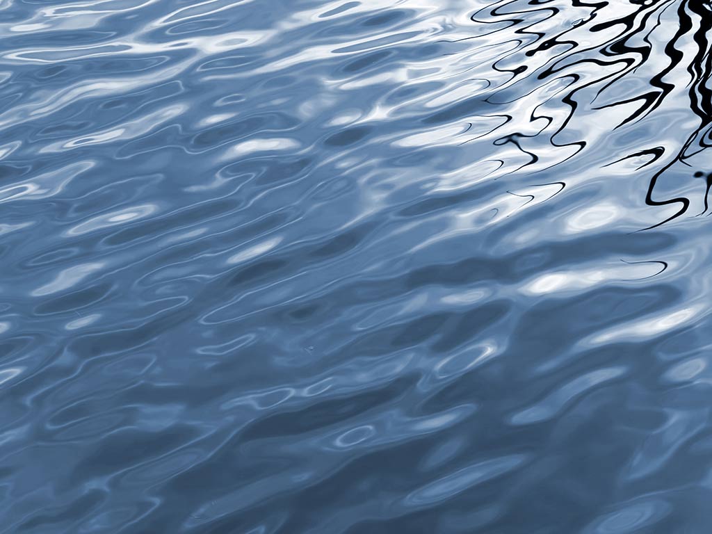 Water background wallpapers of a miniature blue wave on the river