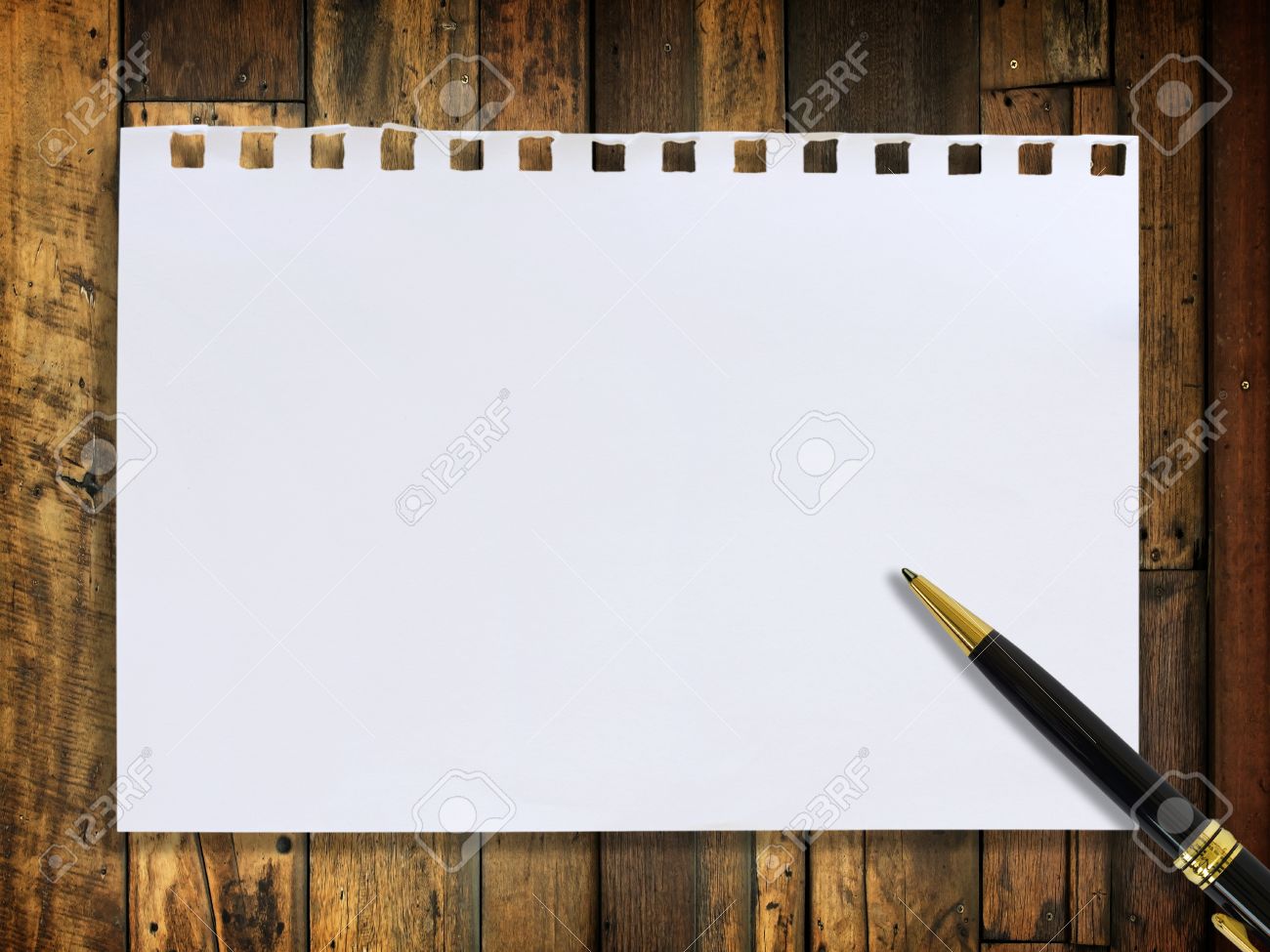 Paper Note And Pen On Wooden For Texture Background Stock Photo