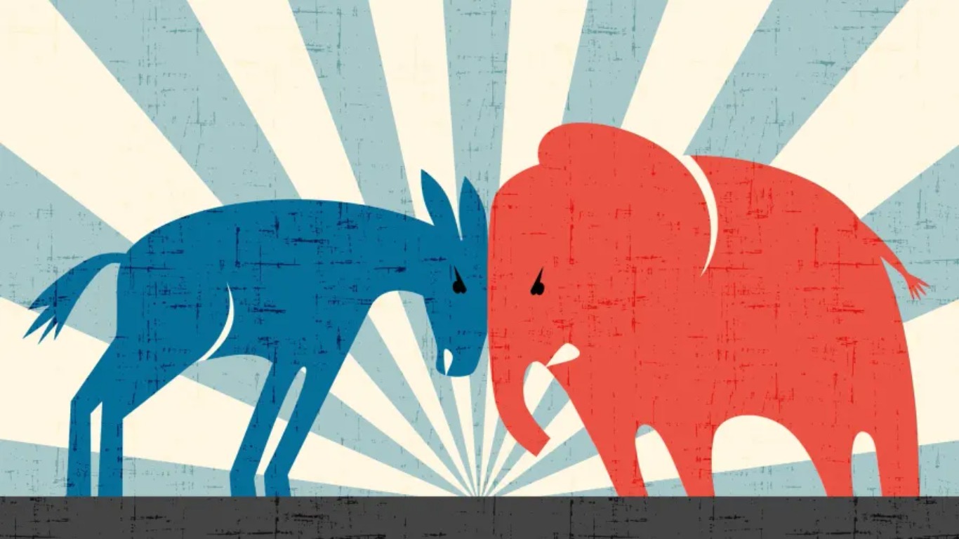 A blue donkey and a red elephant, symbols of the Democratic and Republican parties, facing off against each other