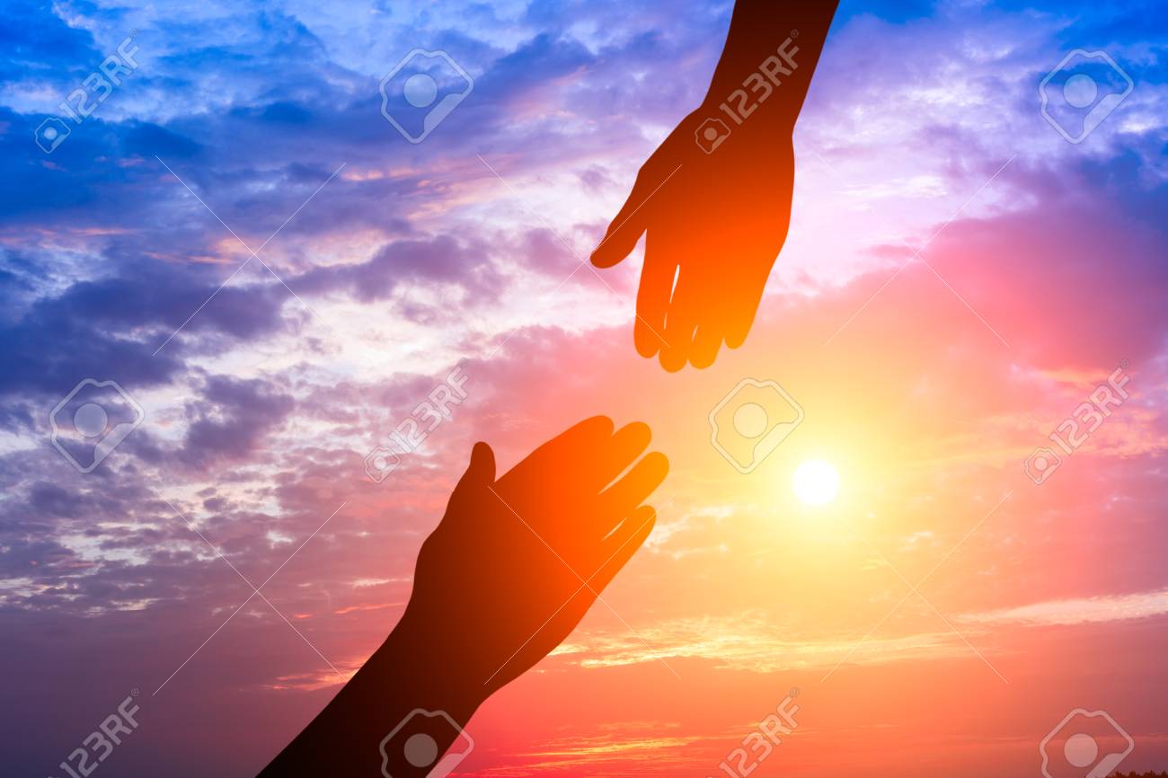 Helping Hand With The Sky Sunset Background Stock Photo Picture