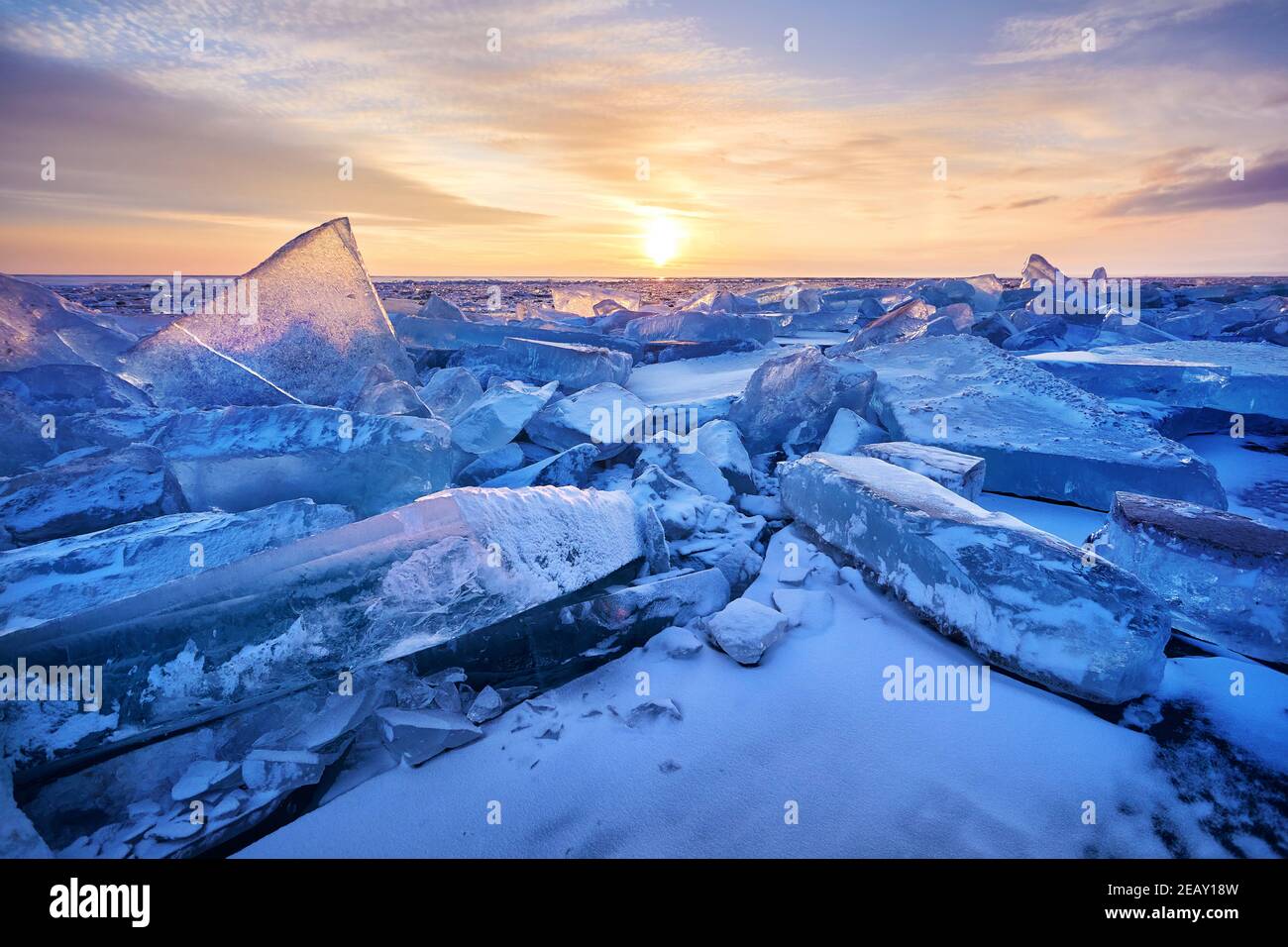 Beautiful landscape of Ice hummock with flare of sunset light at