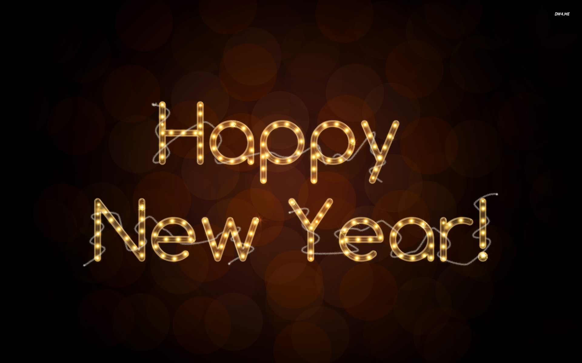 Happy New Year greeting in bright lights against a warm, softly blurred background