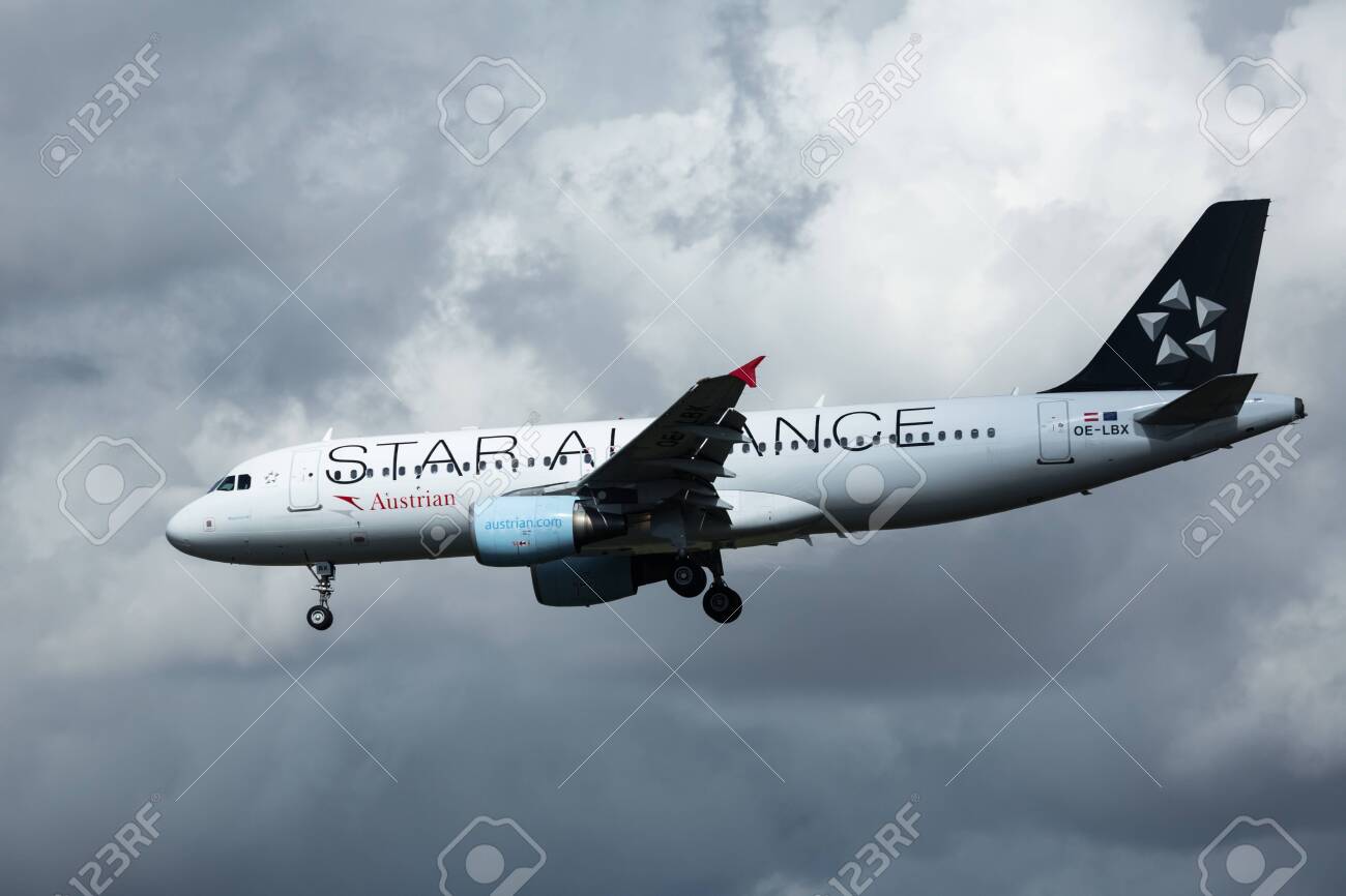 Airbus On The Background Of Thunderstorm Clouds Stock Photo