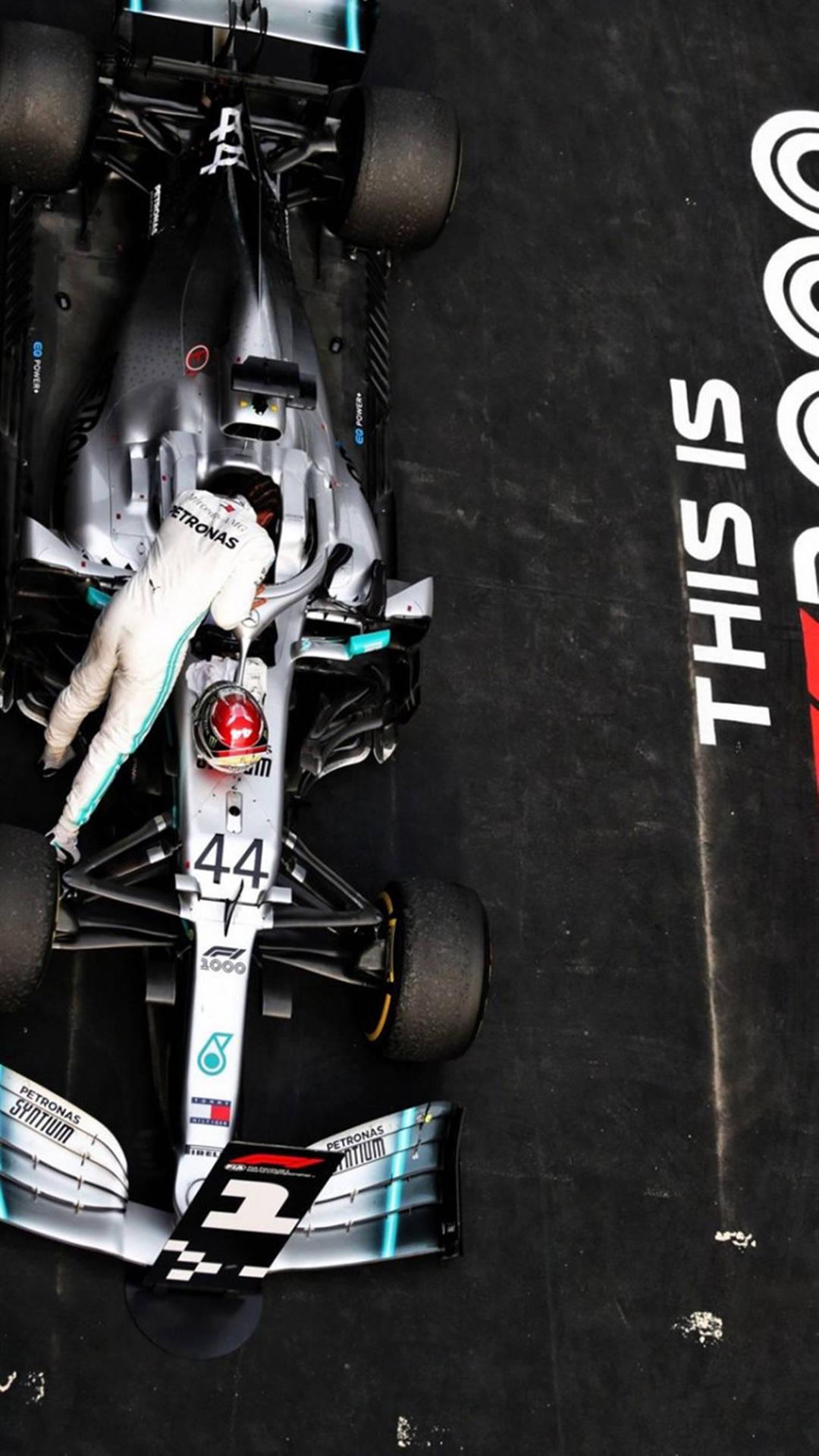 Mercedes F1 iPhone Racer Into Cockpit Wallpaper