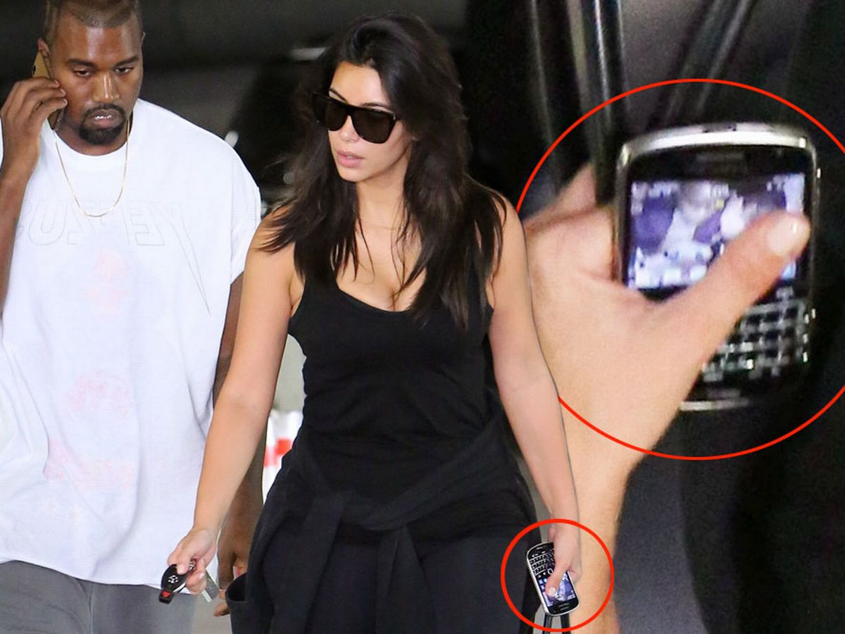 Kim Kardashian S Phone Background Is Loving Photo With Kanye West