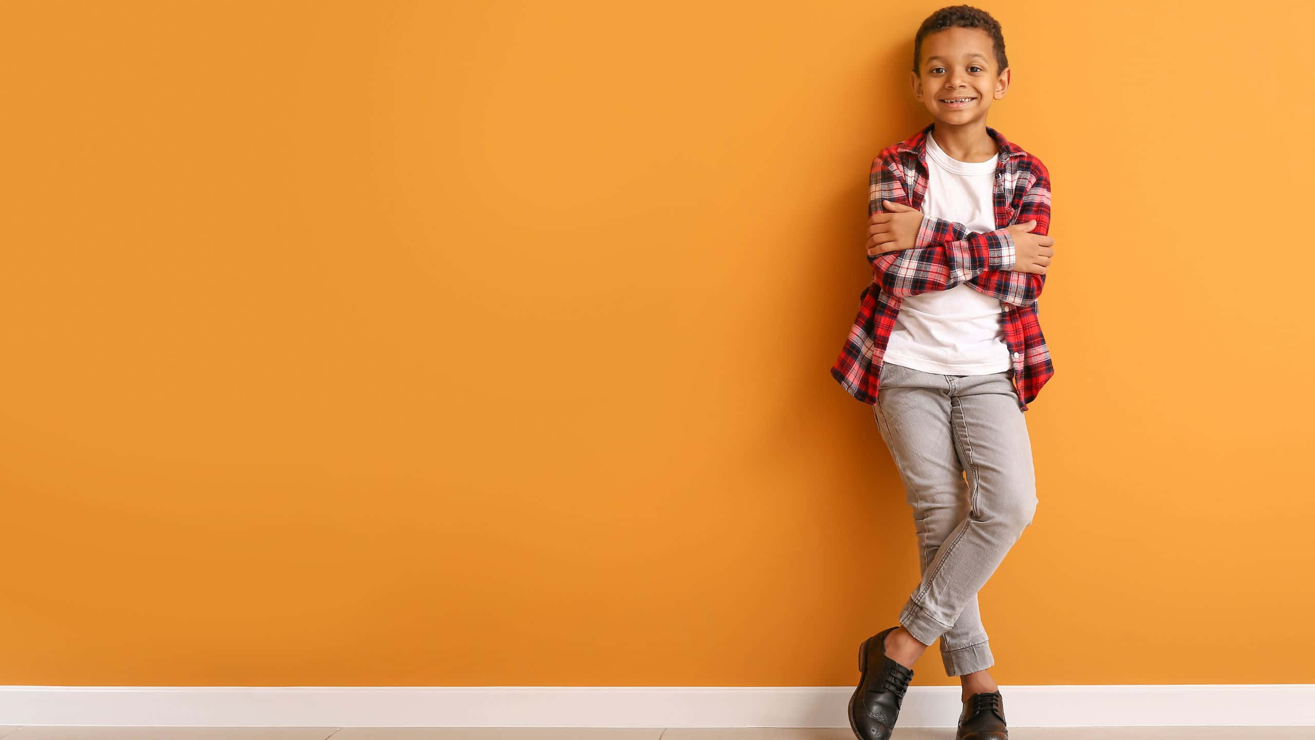 Stylish Boy On Orange Wallpaper