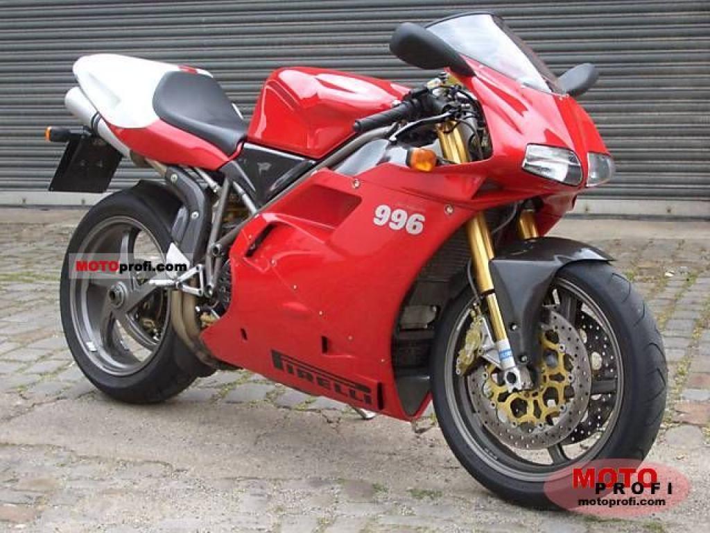 Red Ducati 996 Sportbike parked on a cobblestone street