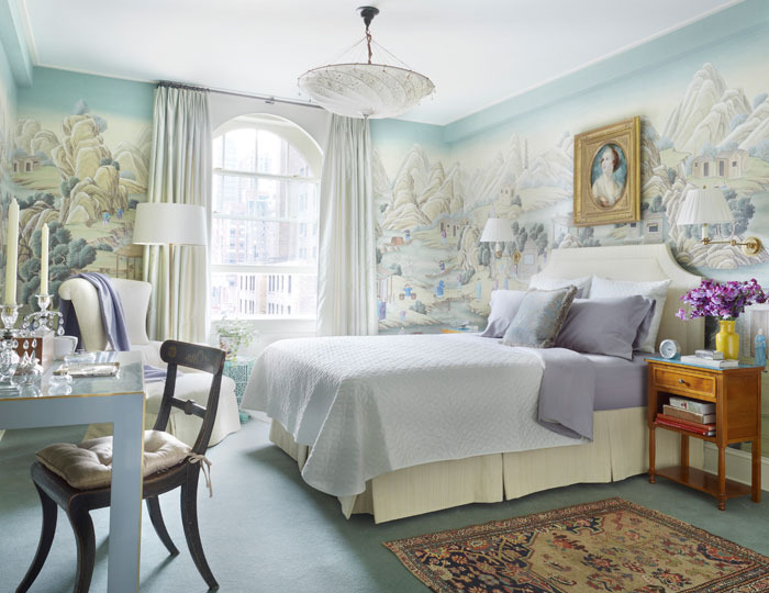 Gracie Chinoiserie wallpaper takes center stage in the master bedroom